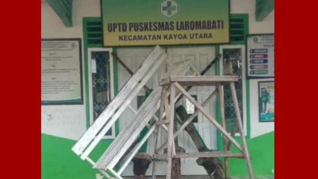 Pemalangan kantor puskesmas Media Berjaringan Indonesia Timur