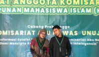 Silfia Dera Wulandari (Kiri) dan Taufiqurrohman, S. E. (Kanan) selaku Ketua Umum dan Sekretaris Umum HMI Komisariat Abu Nawas UNUJA Periode 2024-2025 di RAK ke- IX (MimbarFoto/Abdy)