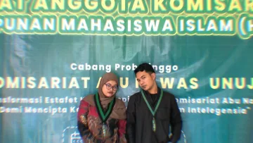 Silfia Dera Wulandari (Kiri) dan Taufiqurrohman, S. E. (Kanan) selaku Ketua Umum dan Sekretaris Umum HMI Komisariat Abu Nawas UNUJA Periode 2024-2025 di RAK ke- IX (MimbarFoto/Abdy)